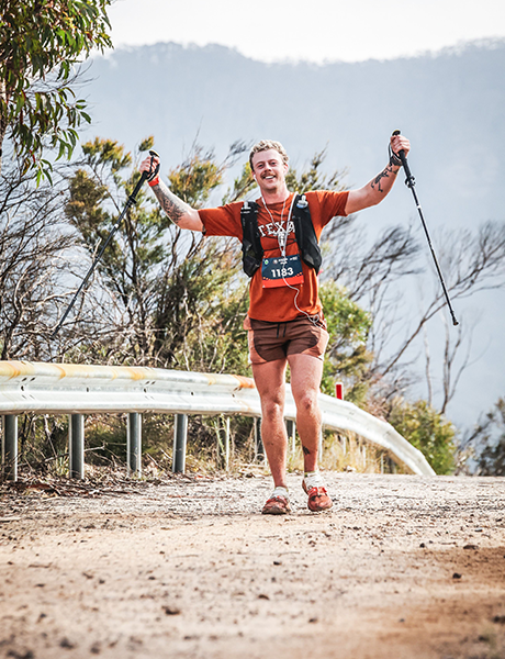 Adam Green wearing Salomon running vest during trail running event