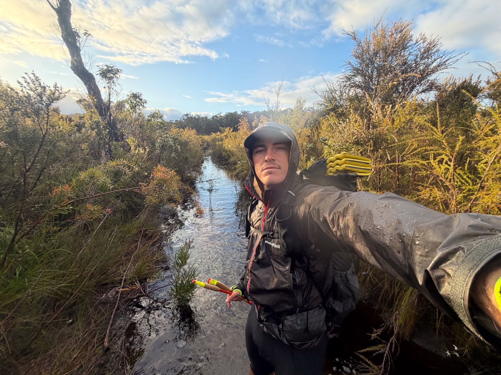 Photo of Cam on Trail in Rain Gear