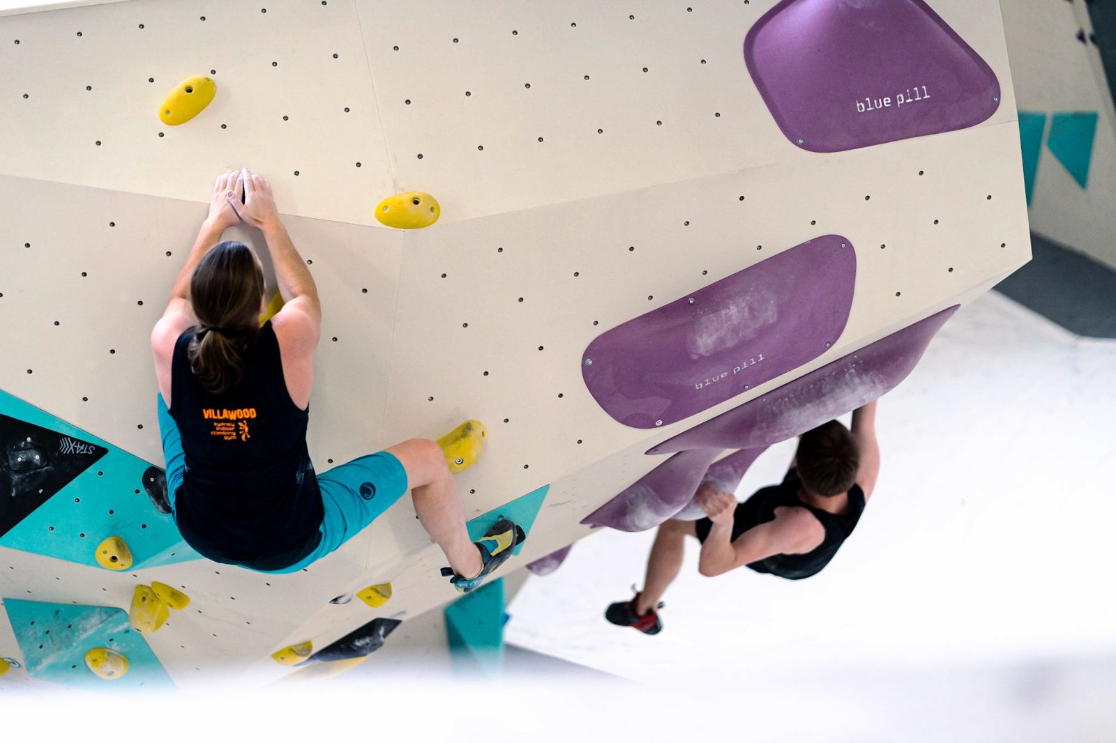 Person climbing on bouldering wall at BlocHaus Melbourne