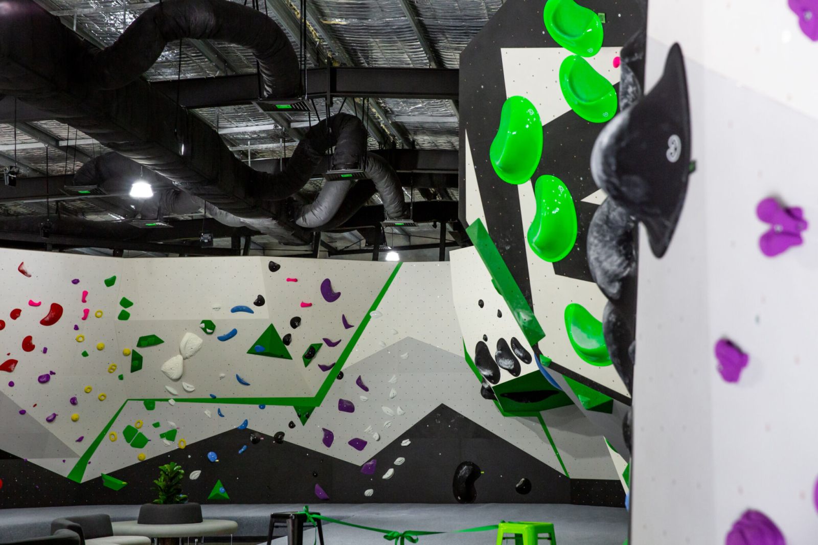 Bould Move bouldering walls - white and black with green holds