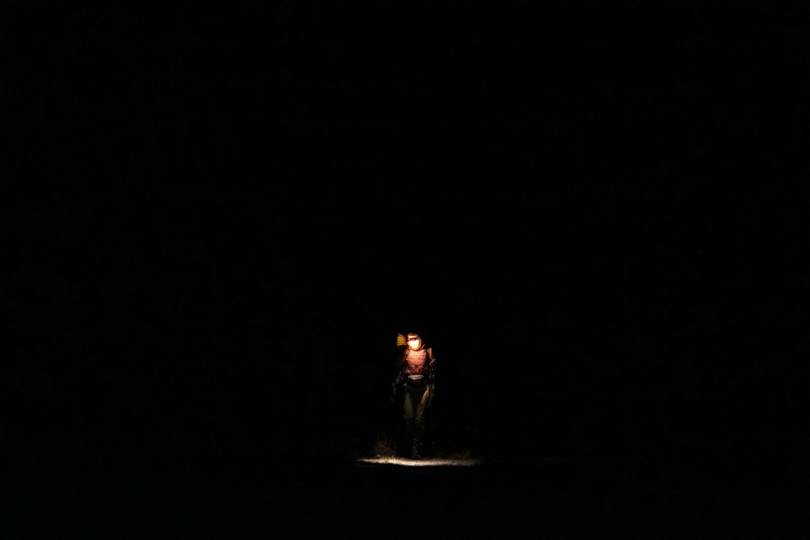 headtorch photo on a dark night