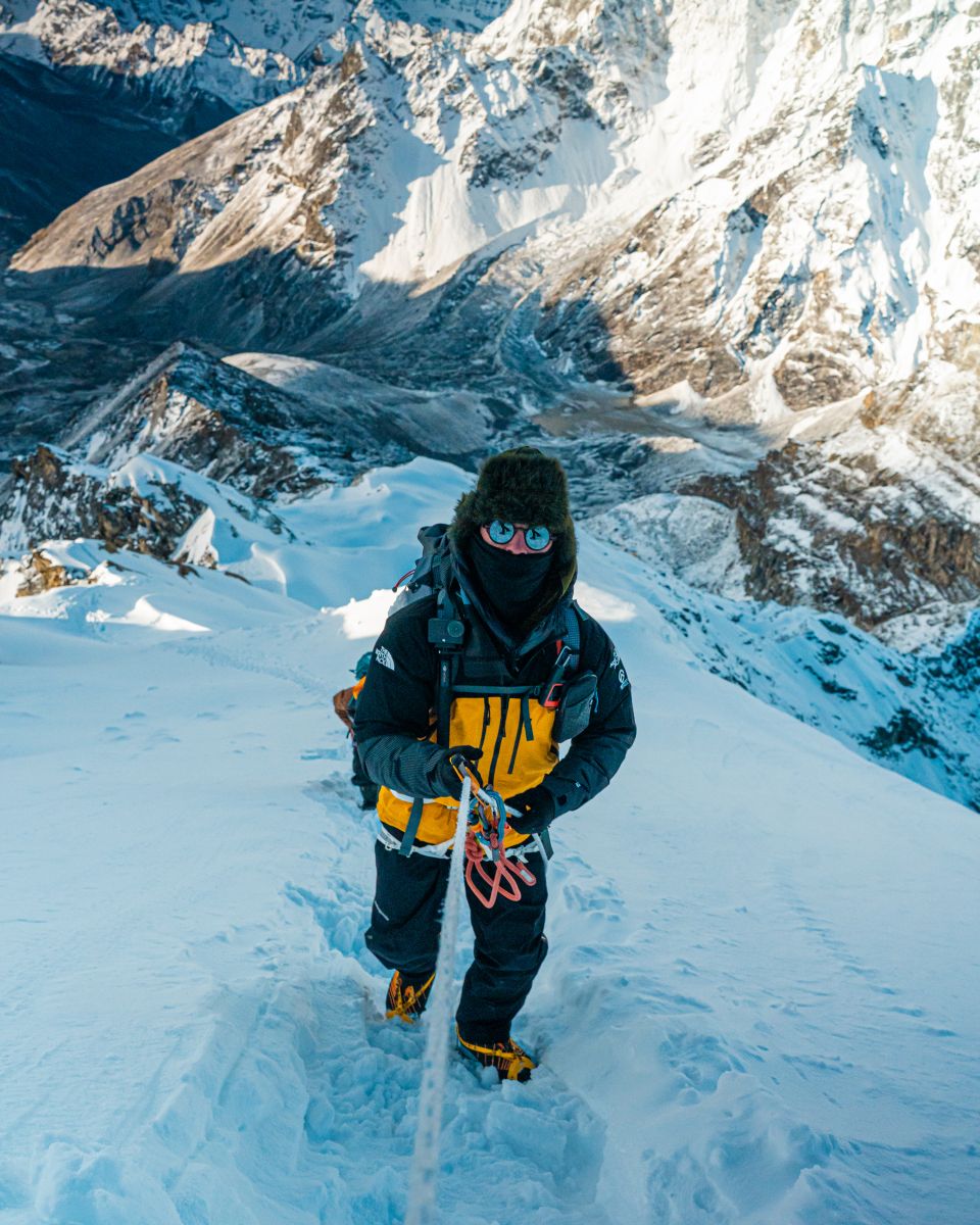 Photo of oli summiting everest 