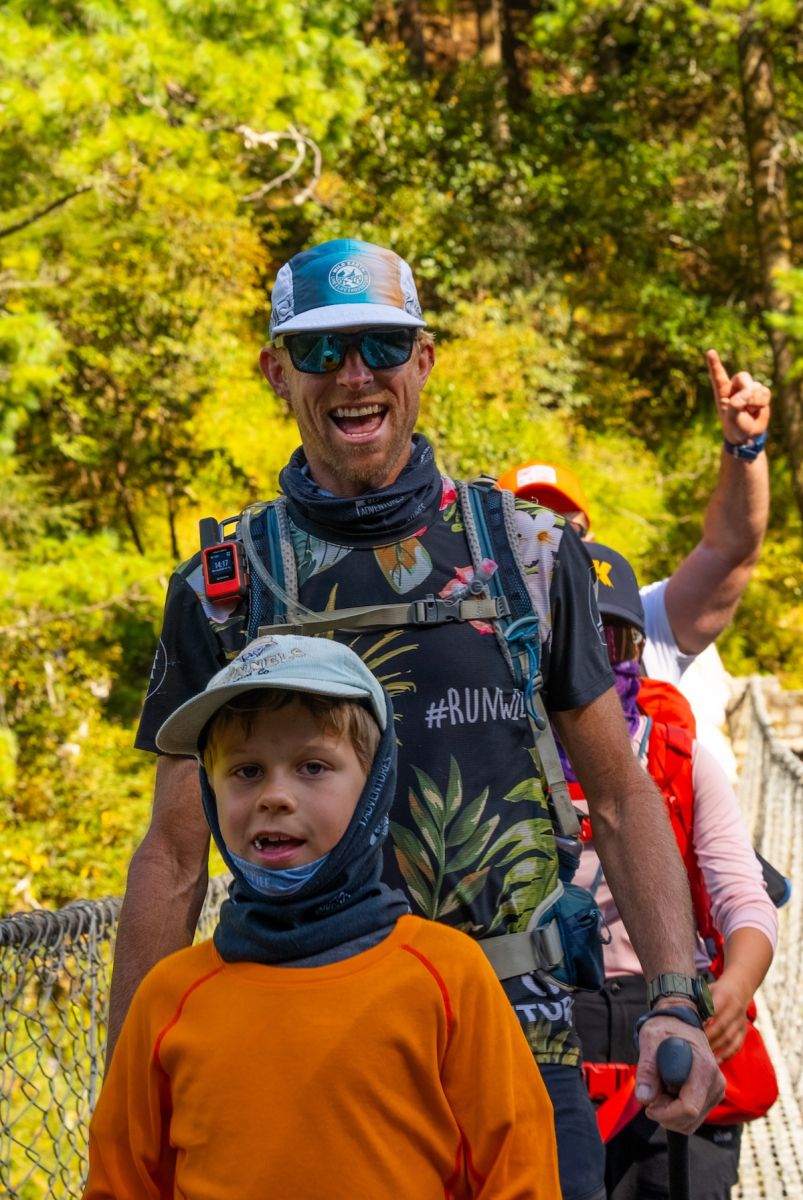 Atlas and Ben on a bridge on the way to everest base camp