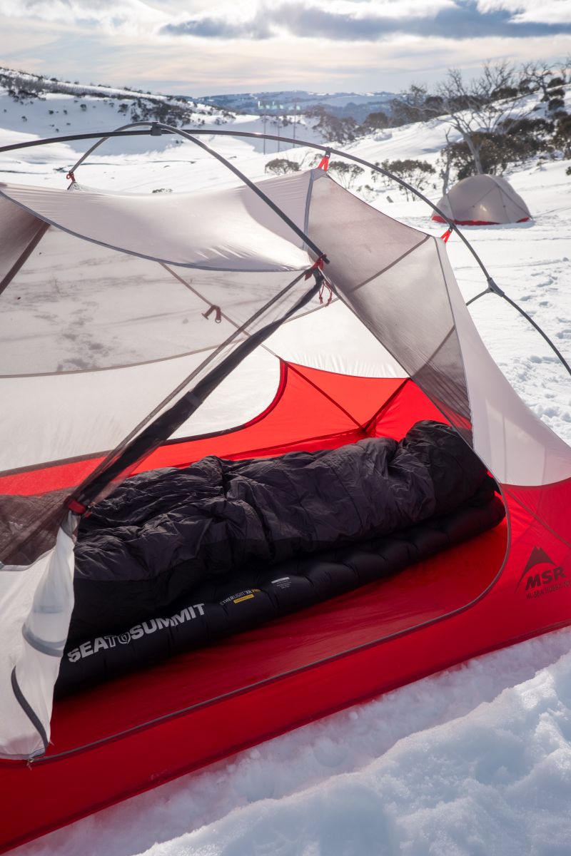 Kurt Winter camping with his Mont Sleeping Bag