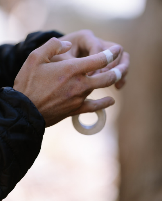 Climber with finger tape