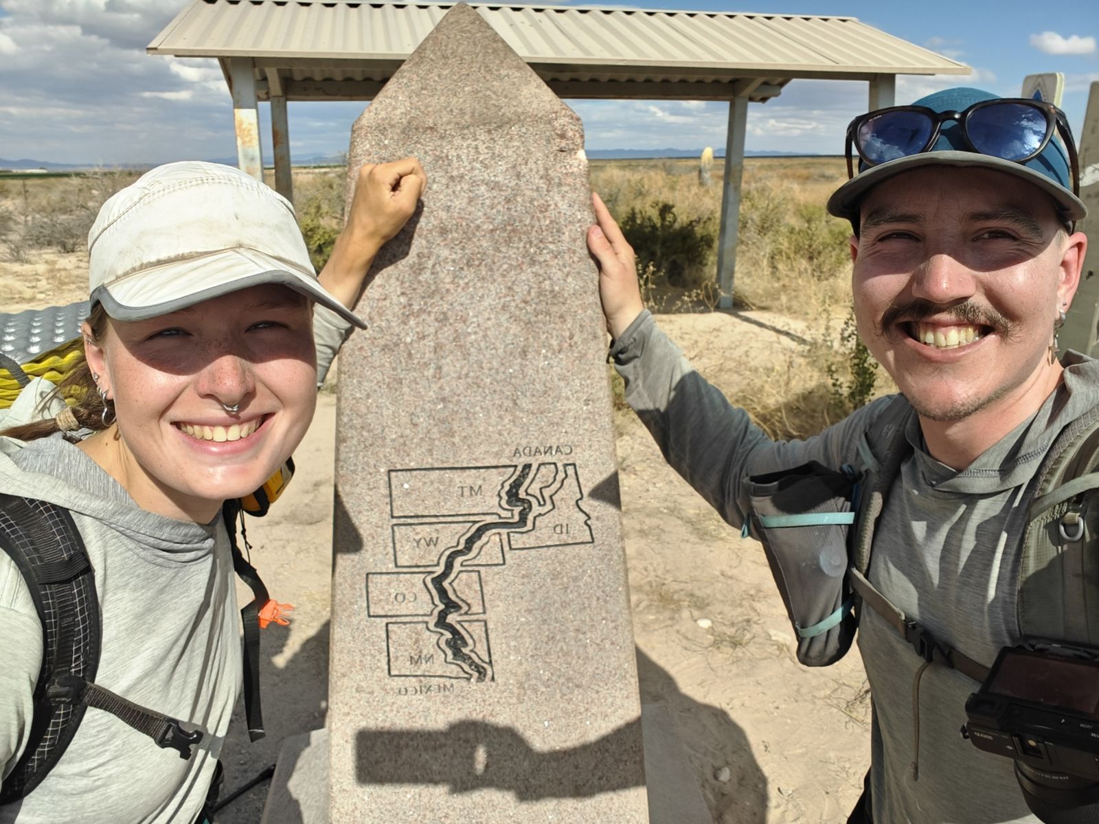 photo of Wombat and Ratatouille at the Mexican border after four months of hiking and camping.
