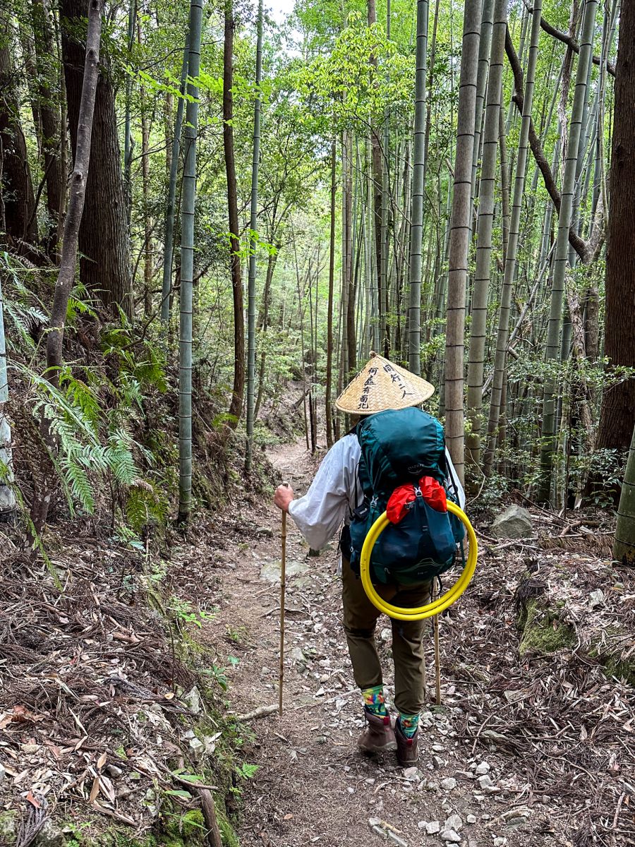 Kiera on a bamboo forest trail on the 88 Temple Pilgrimage. 