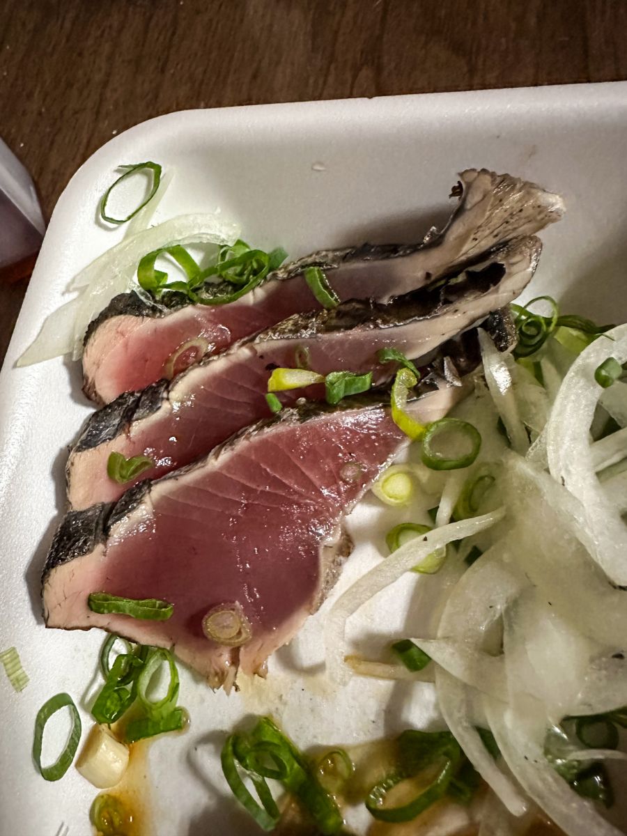 The famous Katsuo no Tataki (seared bonito fish) local to Kochi Prefecture and gifted to Kiera by a local fisherman