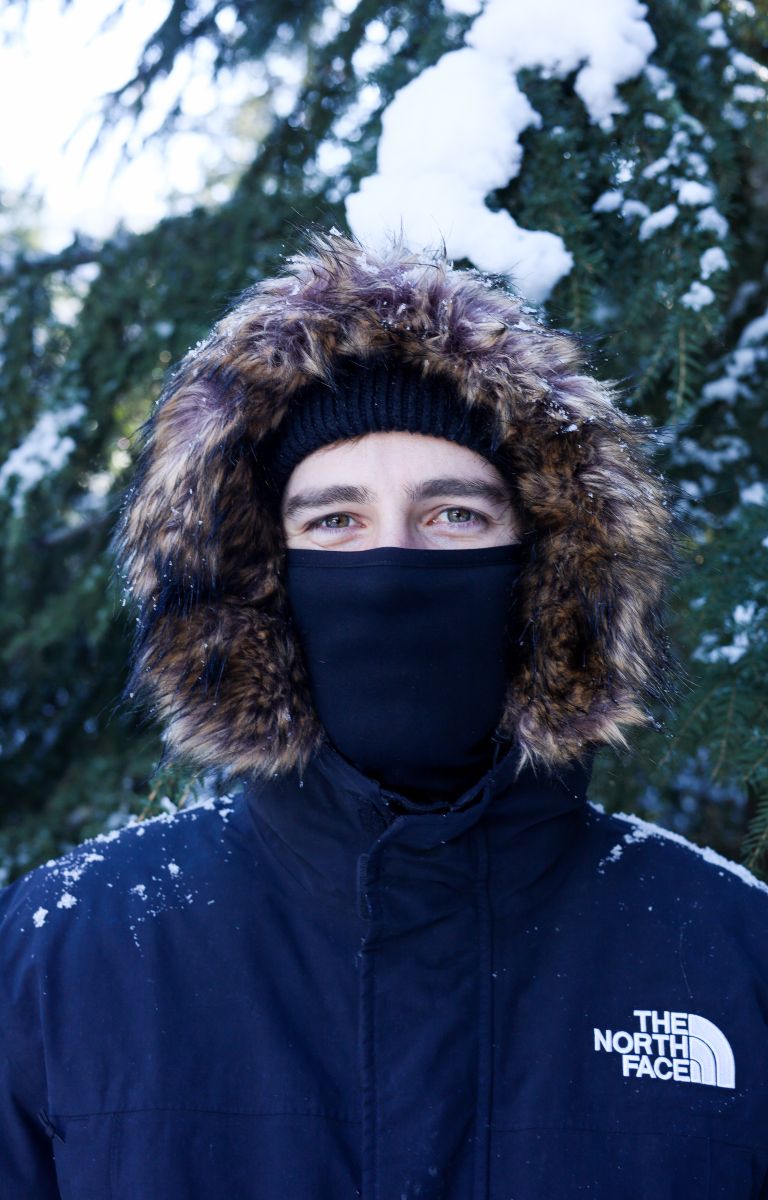 Male wearing The North Face McMurdo jacket in Black