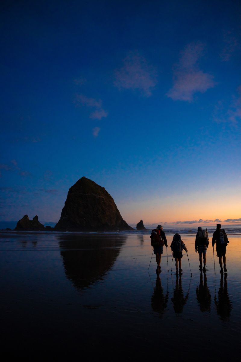 Jactina and friends on Cannon Beach, Oregon at sunset