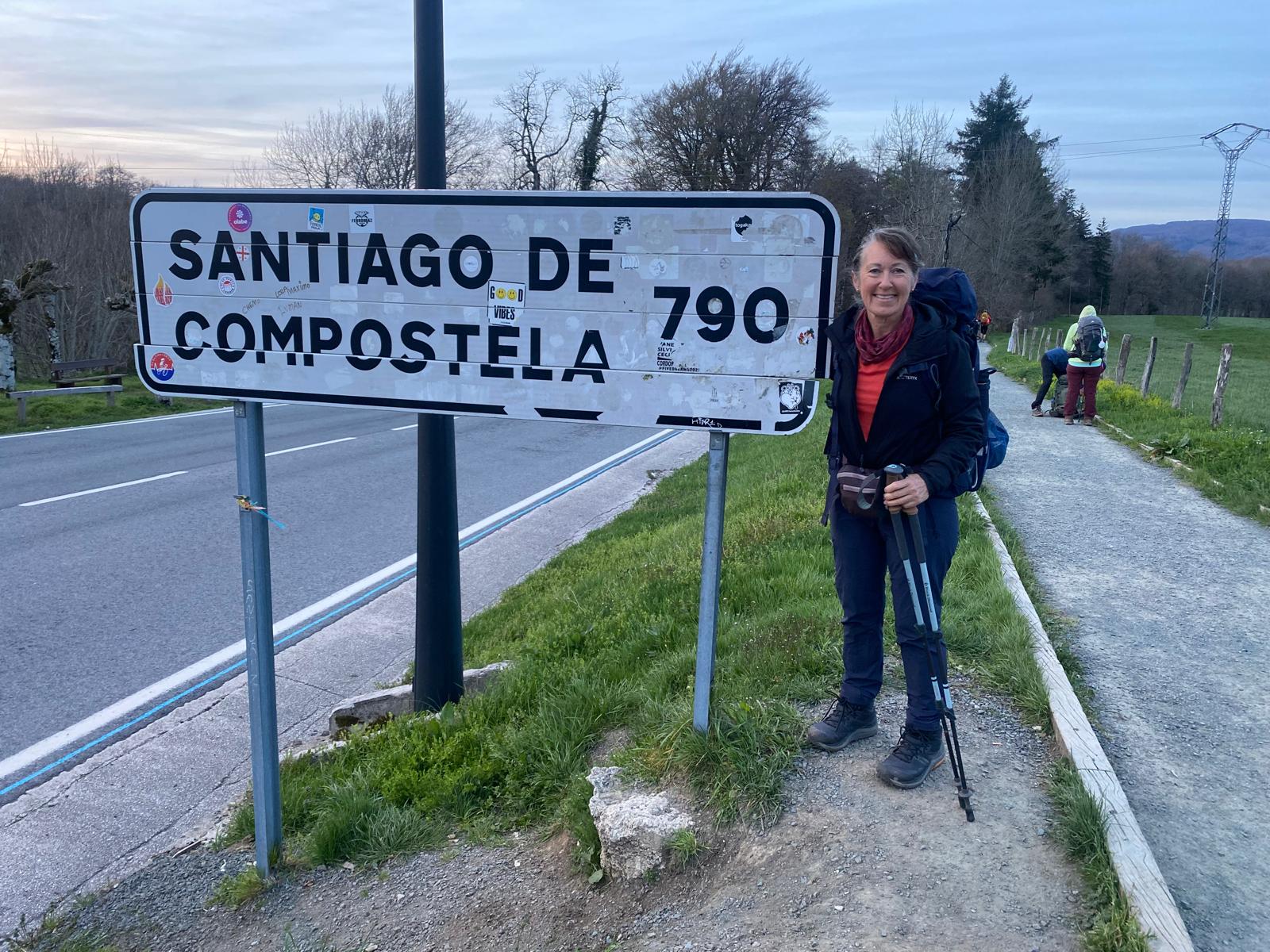 Lynne at the 790km Santiago de Compostela road sign starting the Camino Frances walk