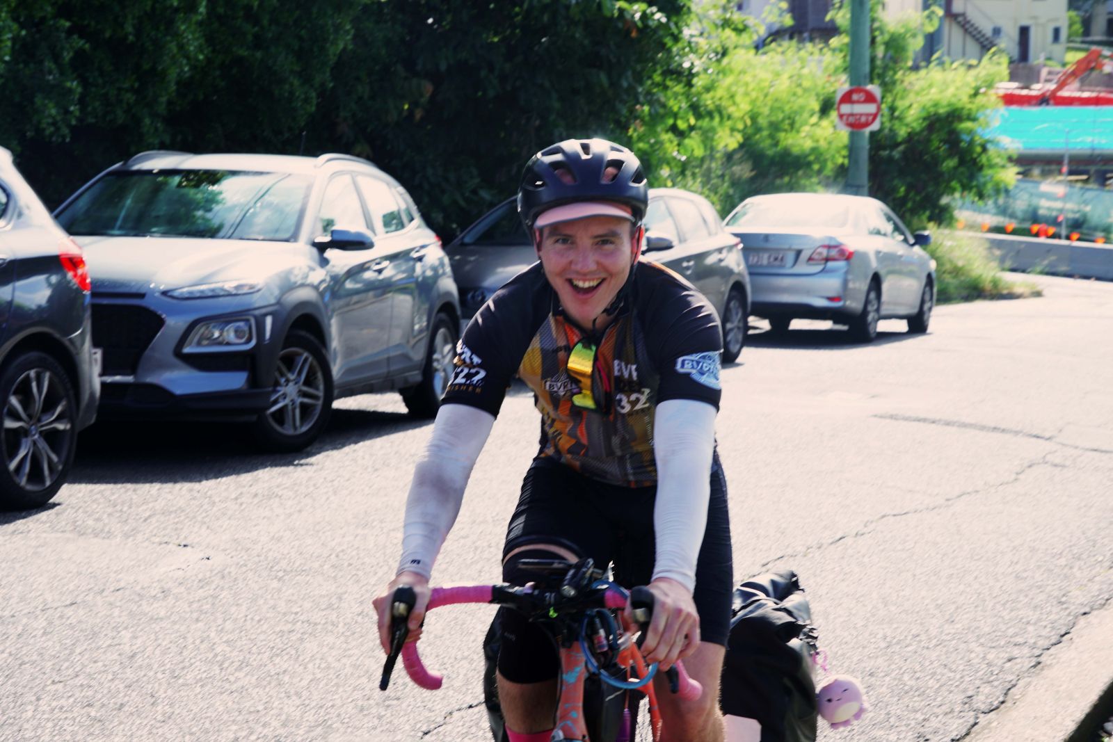 Reid on a bike leaving Brisbane