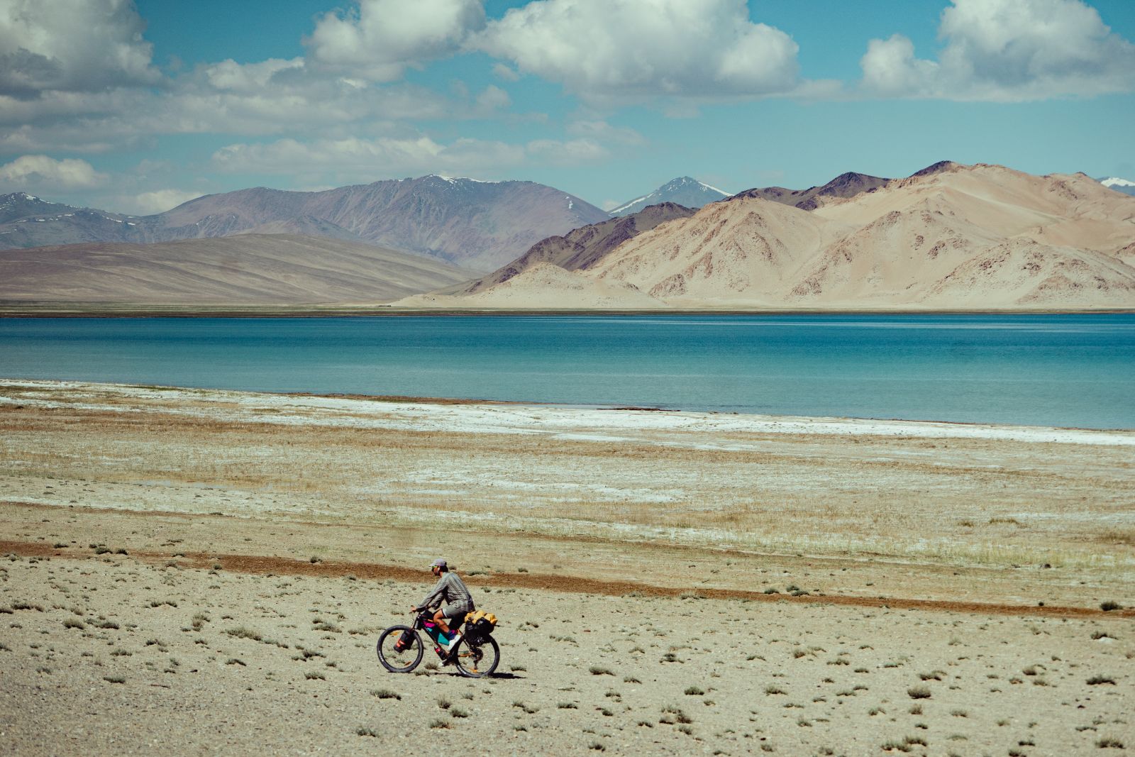 Riding near a mountain lake