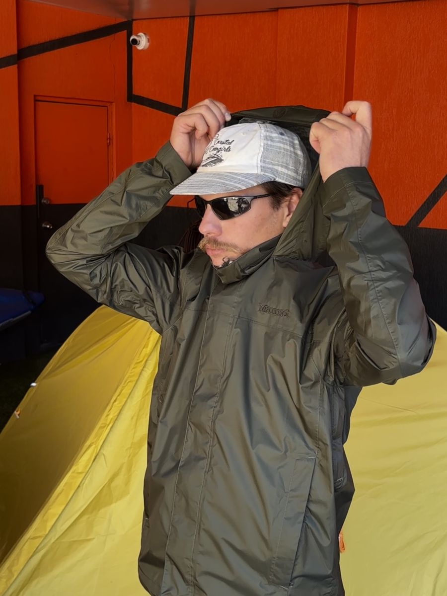 Sam Schooley Wild Earth Gear Specialist Wearing Marmot Rain Jacket at Wild Earth HQ