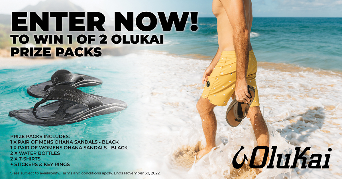 WIN 1 of 2 Olukai Prize Packs! - Beach scene with Olukai sandals. 