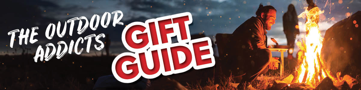 Outdoor Addicts Gift Guide - image of man sitting by a fire