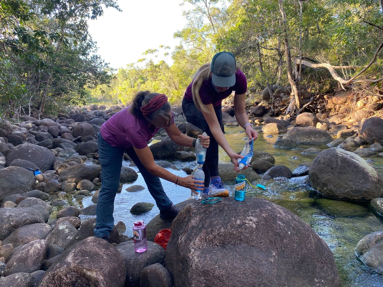 Tash and Lynne Filtering Water on the Trail