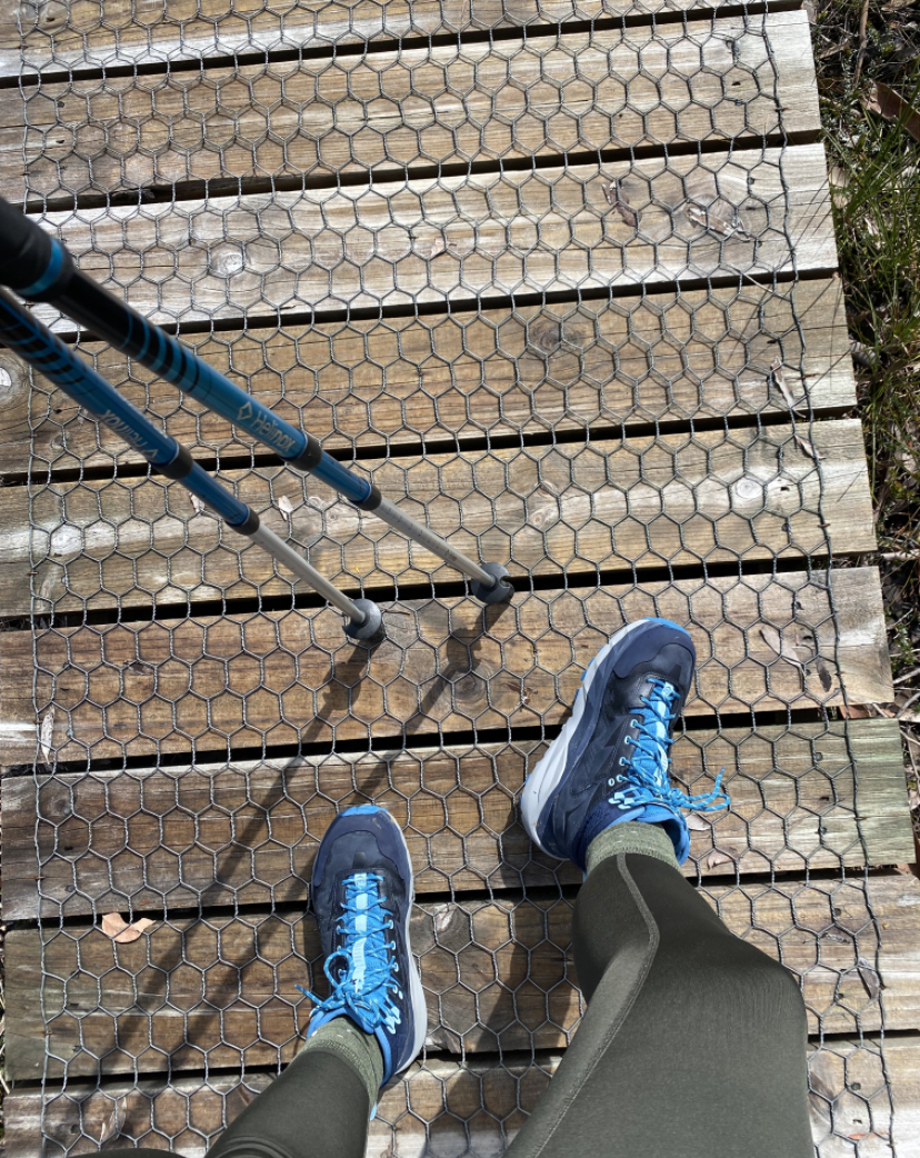 Hoka Hiking Boots in Blue on the Three Capes Hiking Track boardwalk