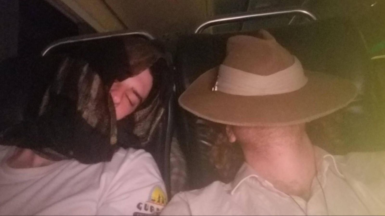 Ronan and Tristan sleeping on the Spirit of Queensland train
