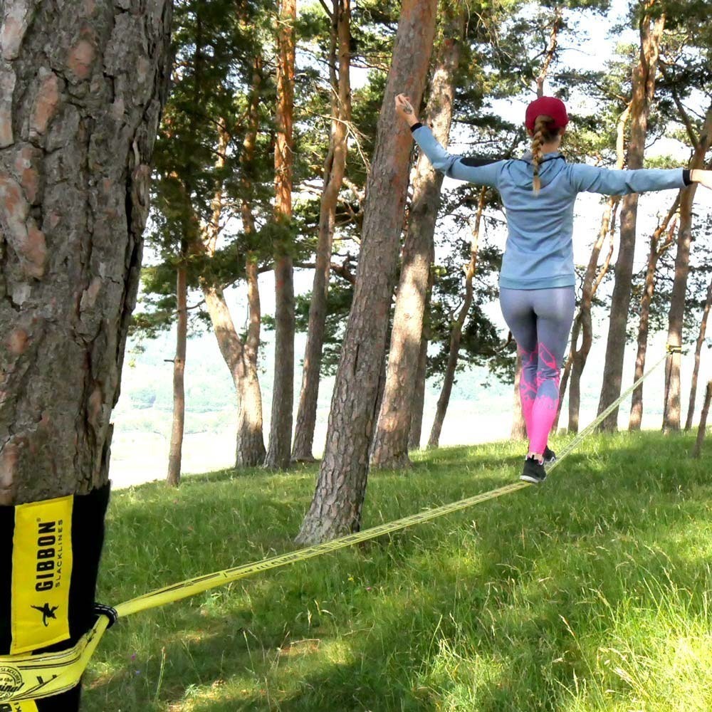 Young girl slacklining 