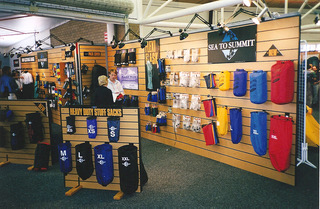 Early trade show, displaying Sea To Sumimit stuff sacks, gaiters, liners, map cases, dry bags, dry towels