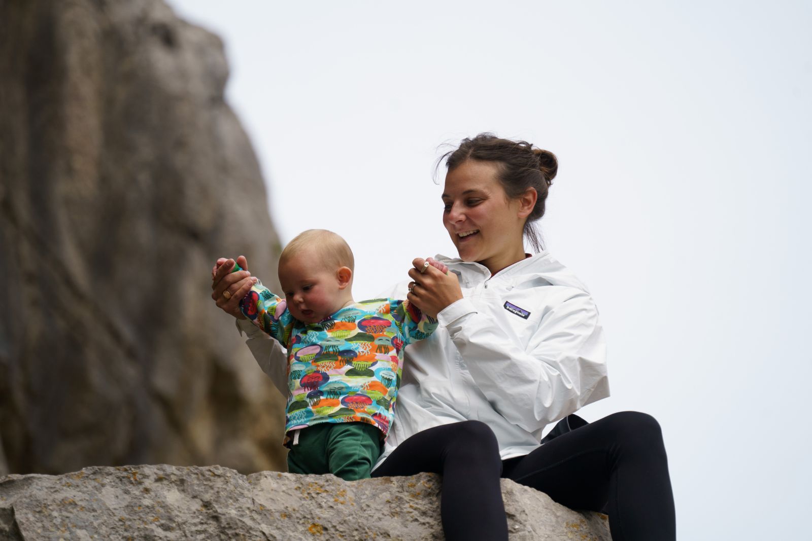 Emily with baby daughter while Emily is wearing while Patagonia Torrentshell Jacket